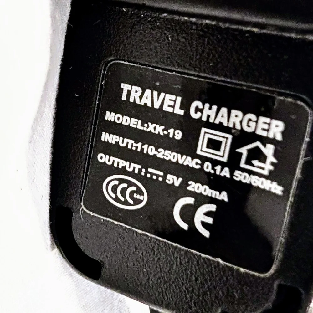 Universal Travel Charger – Model XK-1.9 – 5V 200mA Output